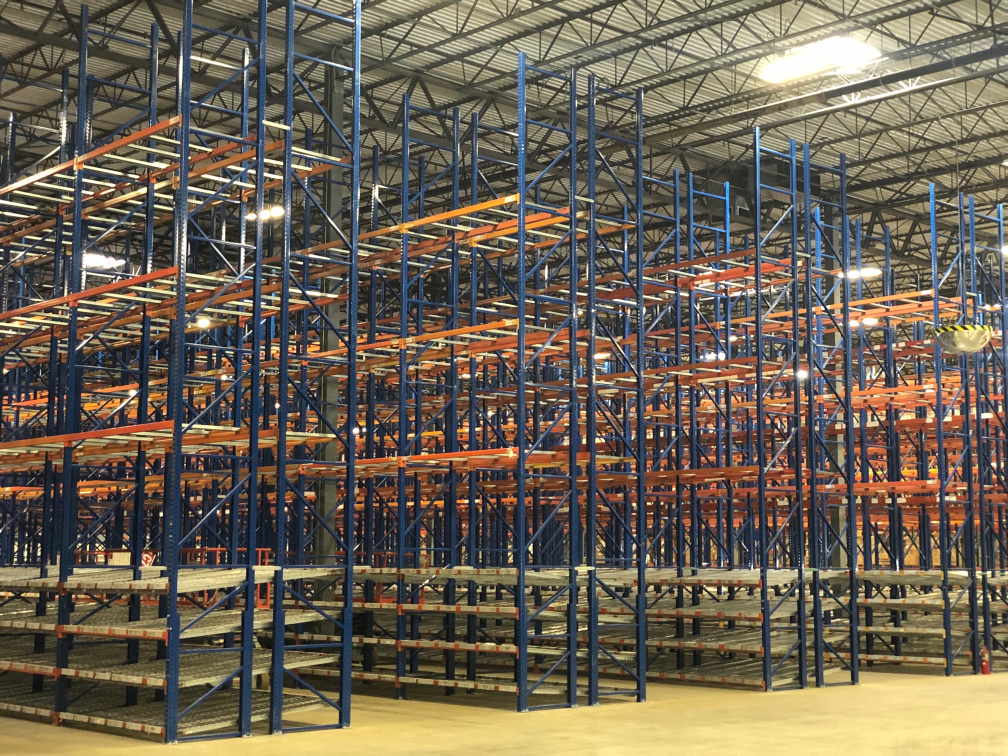 Completed pallet rack rows after an AMH installation