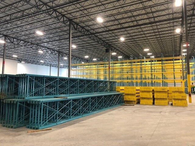 Wide view of a large-scale pallet rack installation