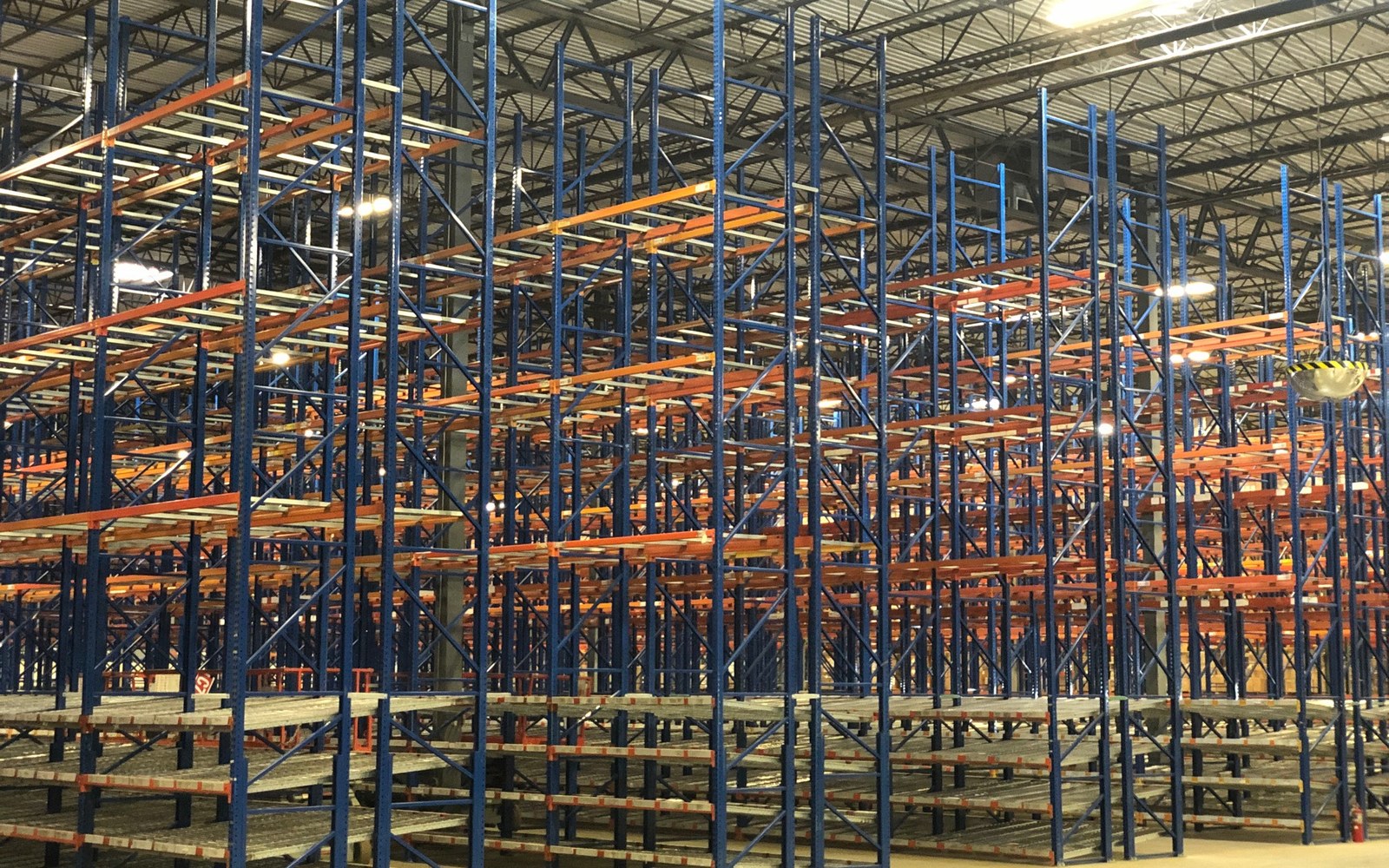 Dense storage and picking sections across a large distribution facility