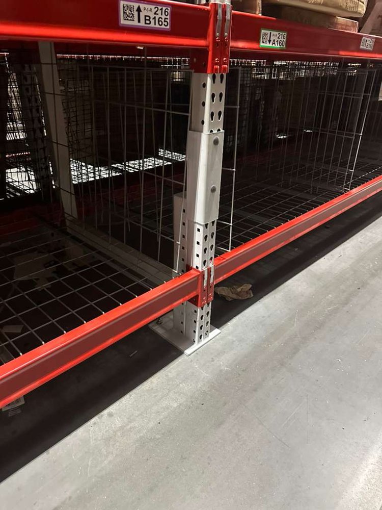 After: RACKCYCLE repair kit installed on a pallet rack upright, restored to original load rating