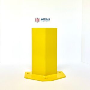 The image shows a yellow column and aisle protector designed to safeguard structural columns and aisle corners in warehouses and industrial settings. The protector has a robust, rectangular shape with a flanged base that features pre-drilled holes for secure mounting to the floor. The bright yellow color ensures high visibility, helping to prevent collisions with forklifts and other machinery. The top of the protector is smooth and flat, indicating a well-finished surface. Above the protector, there is a logo and text that reads "AMERICAN MATERIAL HANDLING," indicating the manufacturer or brand of the product.